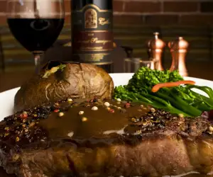 strip steak with peppercorn sauce